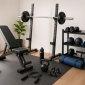 Best home gym equipment for beginners arranged in a compact home workout space with essential fitness gear for small rooms.